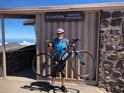 Michael & bike at the summit of Mount Haleakala