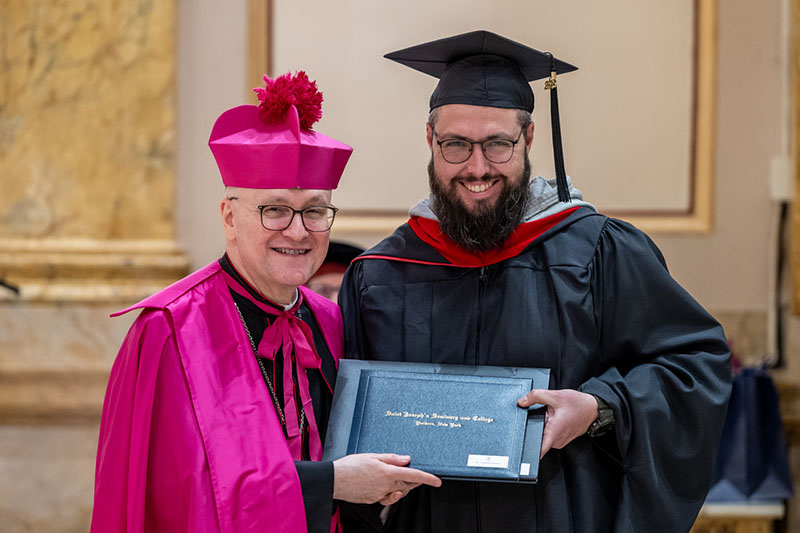 Nate receiving his diploma